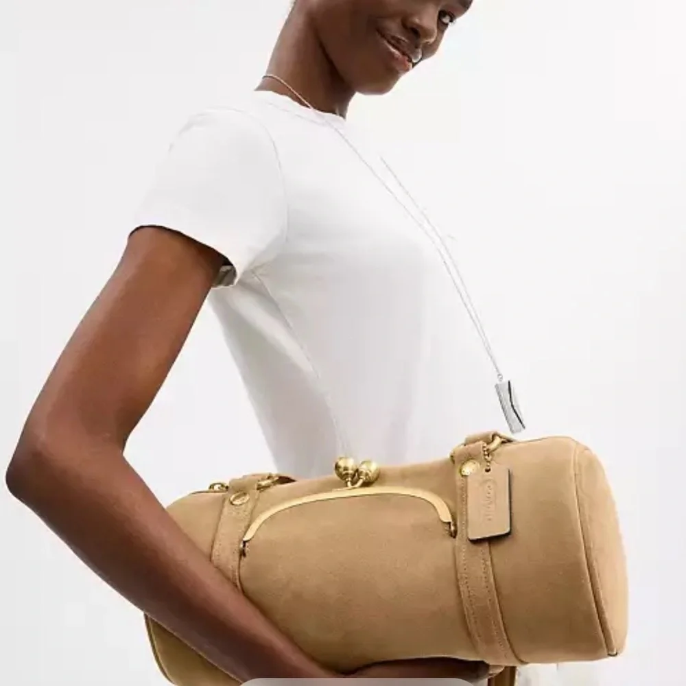 Coach Kisslock Barrel Bag